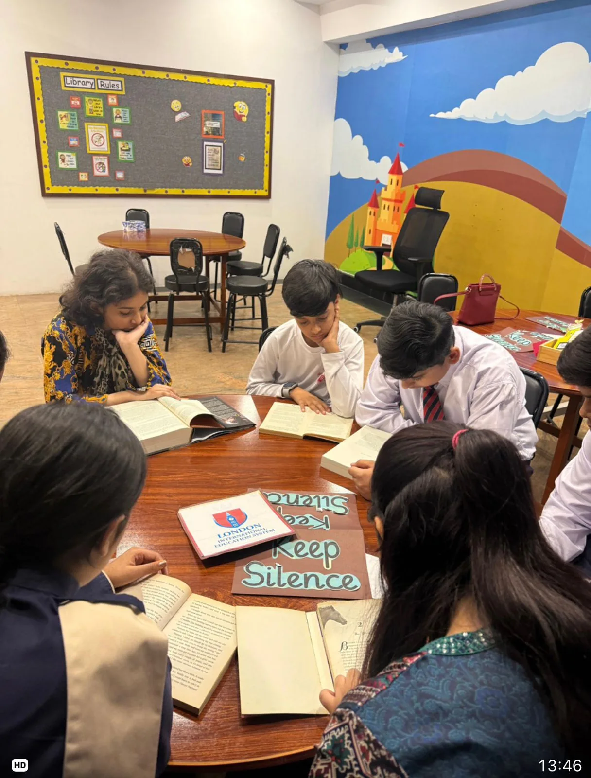Students working in a Lahore school library