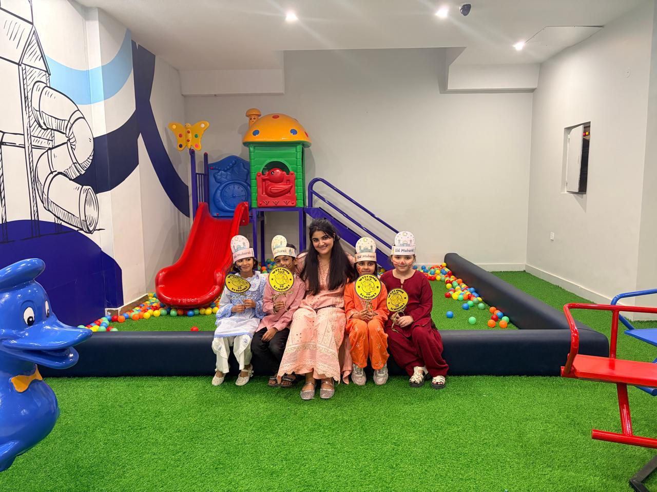 Indoor play area with slides and ball pit